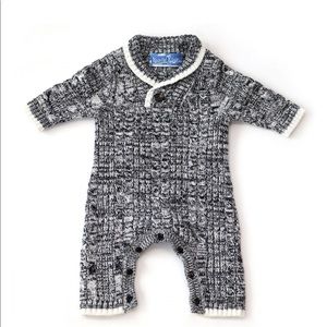 Cable knit shawl collar onesie.